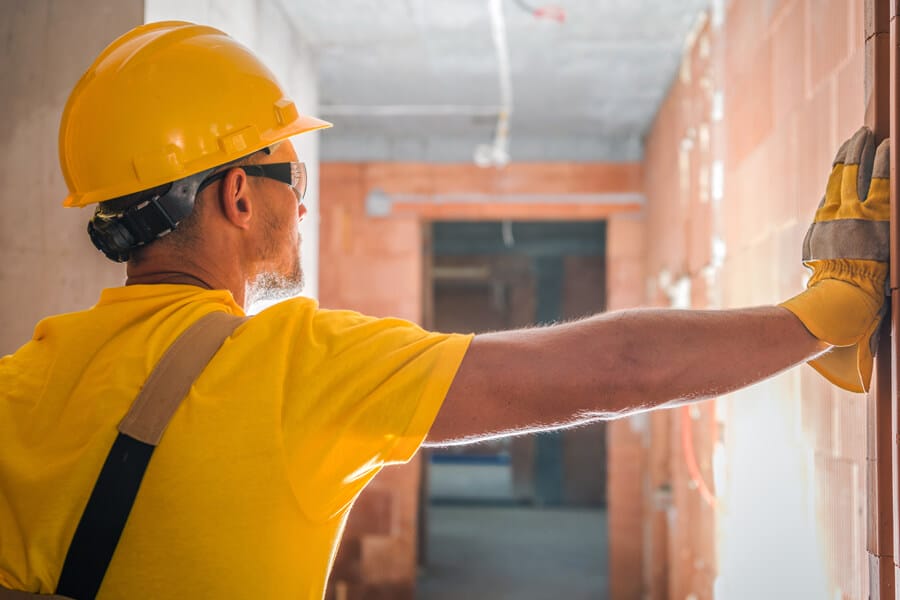 contractor-inside-commercial-concrete-blocks-build-AZTV8H5 commercial inspection